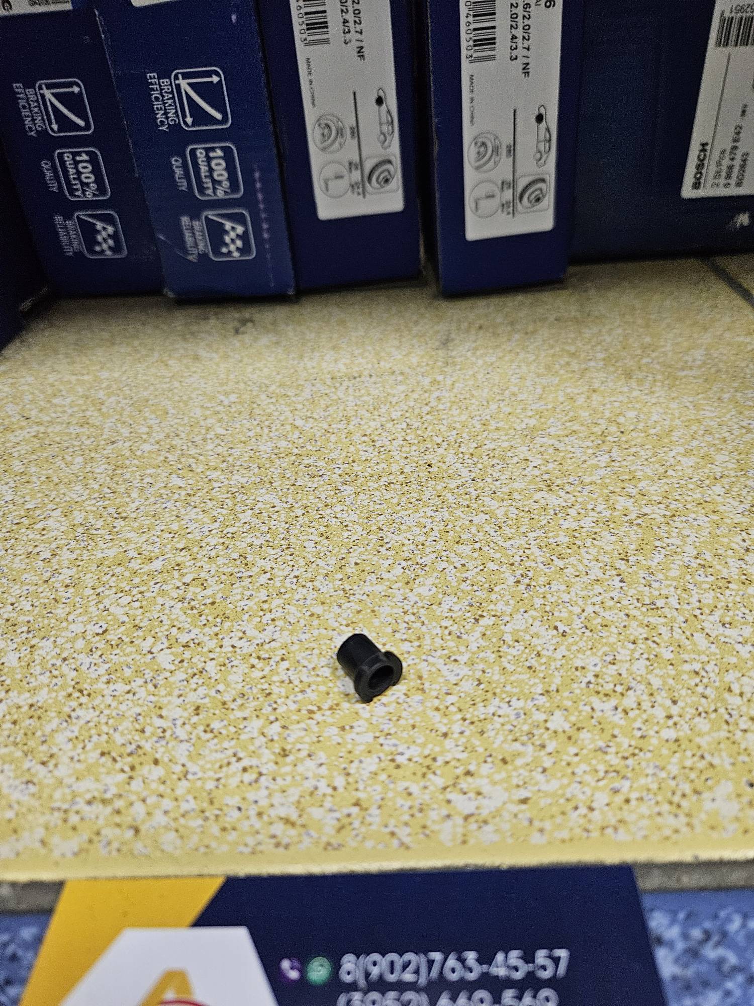 7703081212 Renault А9 Пистон (фиксатор) крепления передней эмблемы Renault оригинал 7703081212