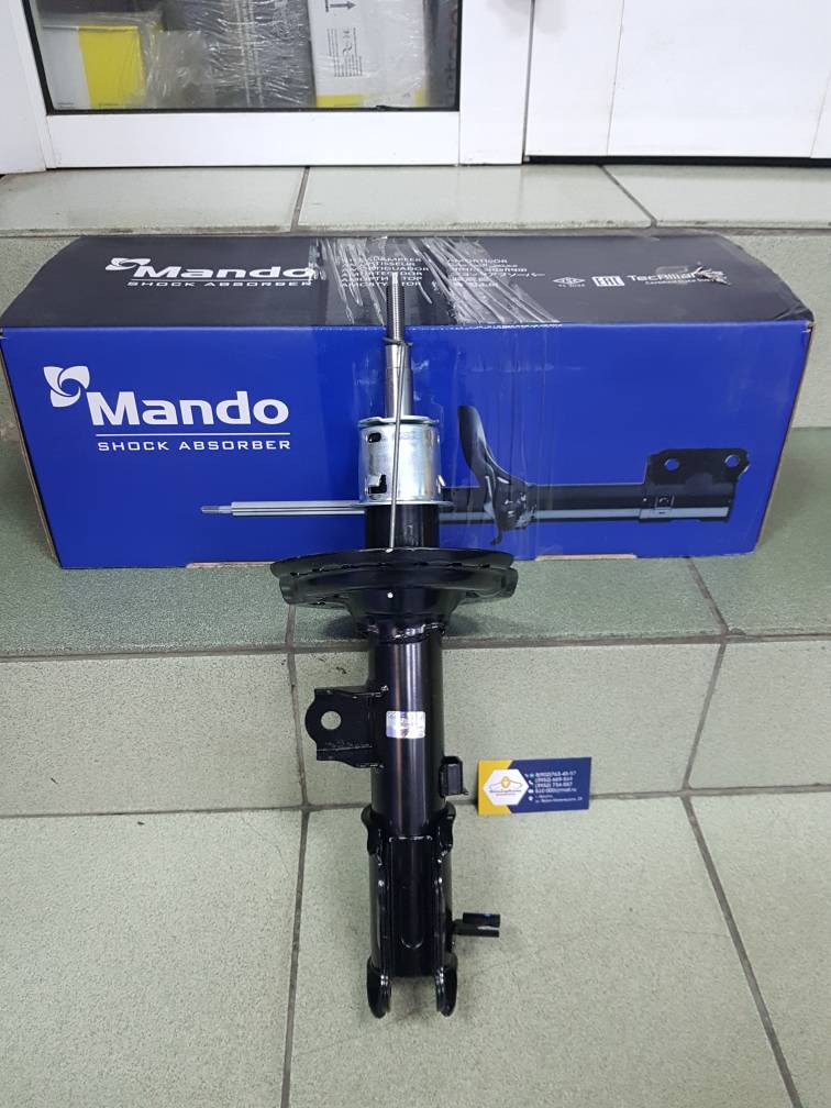 Амортизатор передний (Hyundai/Kia) (Solaris, Rio) Левый Mando EX546504L100 ан 546504L100 / 546501R000